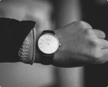 man's hand with a wristwatch on